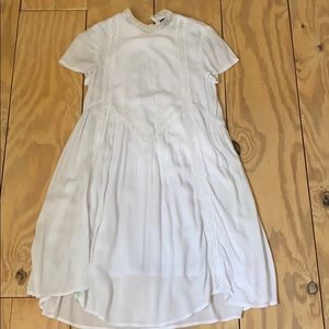 White Francesca’s dress.